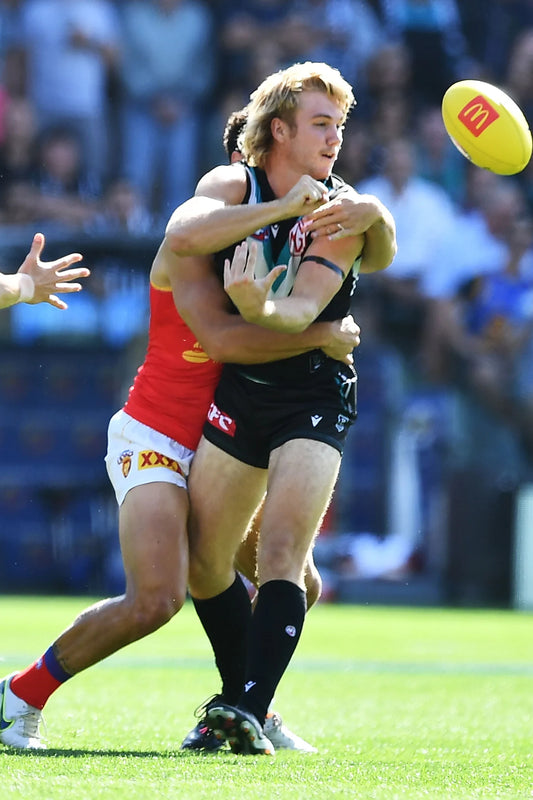 Port Adelaide FC lock in Top 4 AFL Finals Spot with gutsy win over Adelaide in Showdown 56